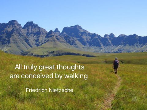 Nietzsche's walking quote with Drakensberg mountain and hiker in background